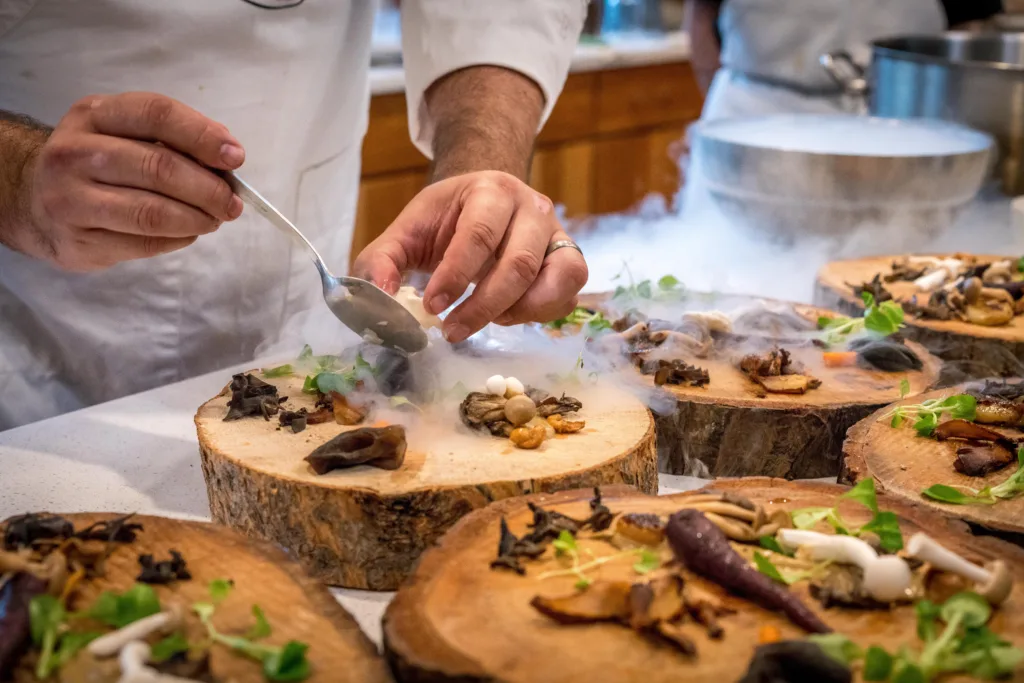 Chef is preparing fine dining dishes - History and Evolution of Commercial Kitchen Equipment