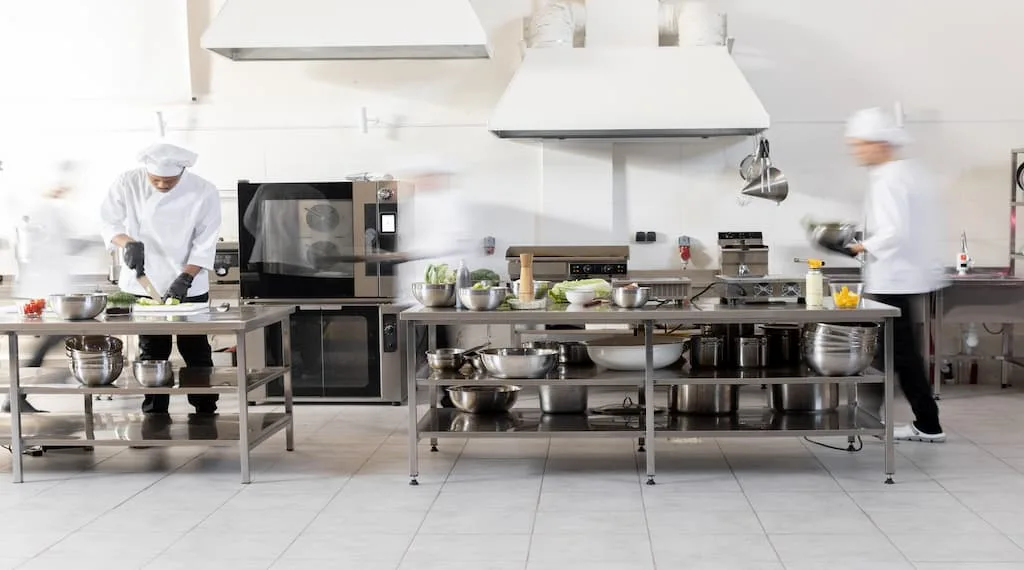 Chef's are working in an ergonomically designed kitchen. 